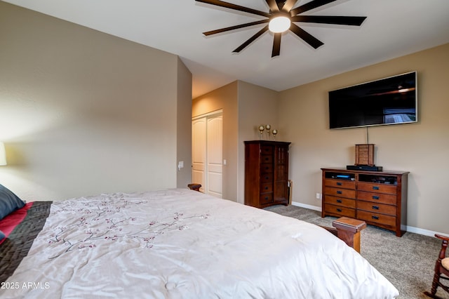 bedroom featuring a closet, carpet flooring, ceiling fan, and baseboards