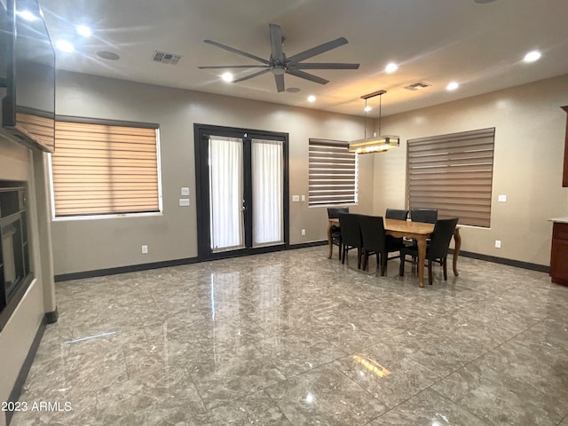 dining room featuring ceiling fan