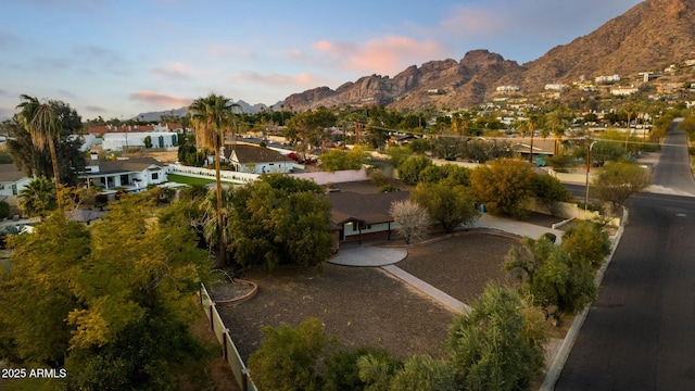 aerial view at dusk with a mountain view