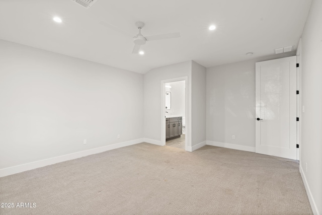 unfurnished room featuring light carpet and ceiling fan