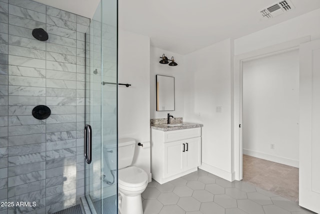 bathroom with walk in shower, tile patterned floors, vanity, and toilet