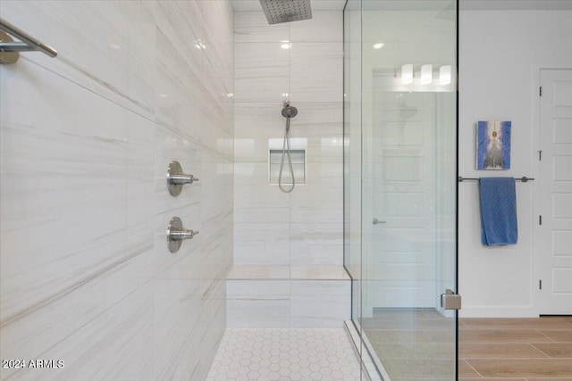 bathroom featuring an enclosed shower