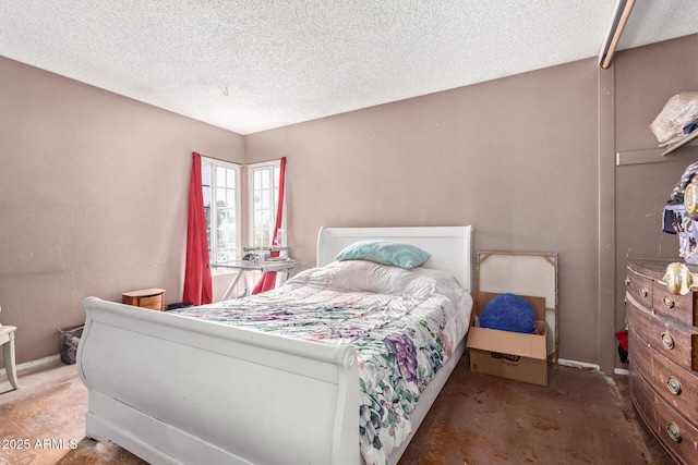 bedroom with a textured ceiling