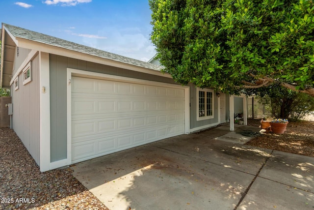 garage featuring driveway