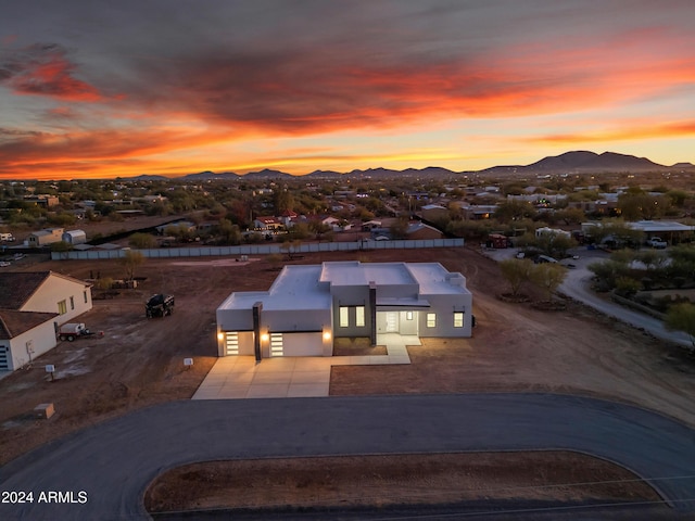 aerial view at dusk with a mountain view