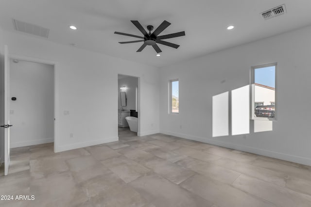 empty room with plenty of natural light and ceiling fan