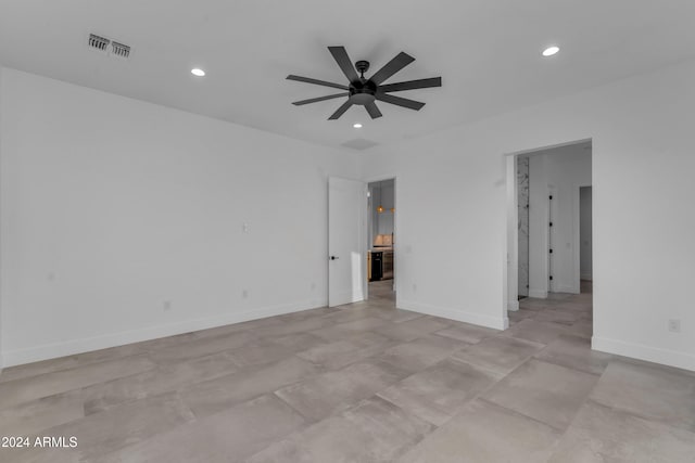 unfurnished room featuring ceiling fan