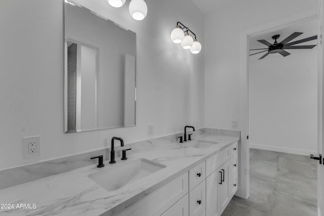 bathroom featuring ceiling fan and vanity