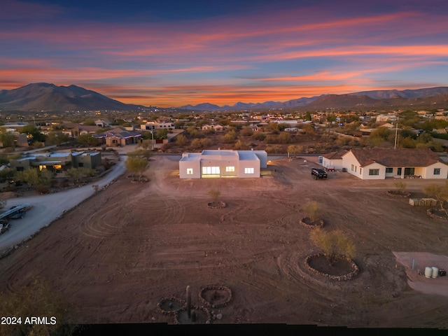 aerial view at dusk with a mountain view