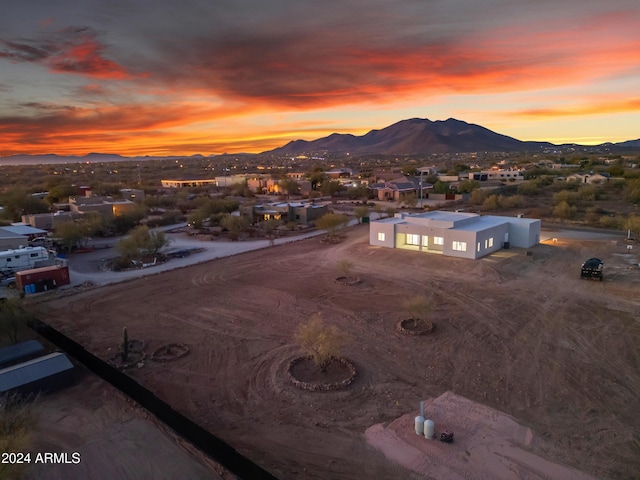 aerial view at dusk with a mountain view