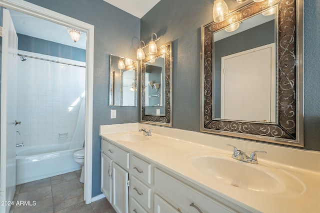 full bathroom with vanity, toilet, and shower / tub combo