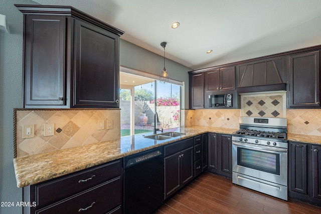 kitchen featuring black appliances, sink, hanging light fixtures, decorative backsplash, and dark hardwood / wood-style floors