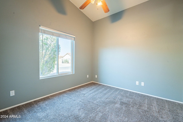 carpeted empty room featuring high vaulted ceiling and ceiling fan