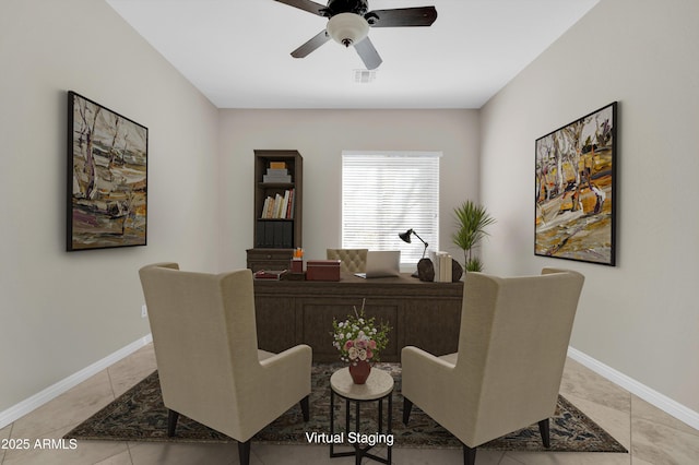 sitting room featuring light tile patterned floors and ceiling fan