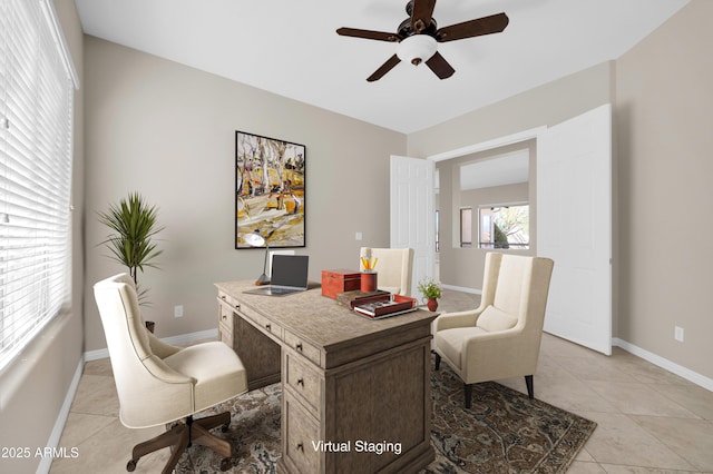 office area with ceiling fan and light tile patterned floors