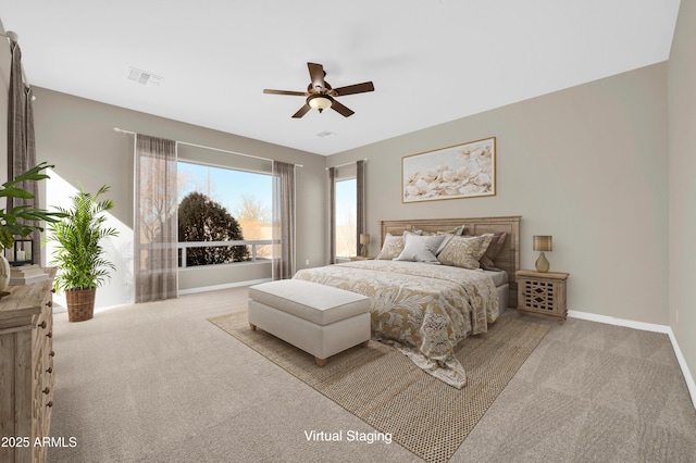 carpeted bedroom featuring ceiling fan