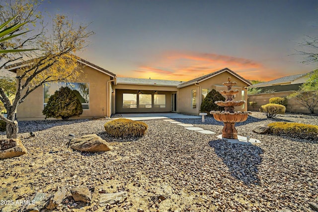 single story home featuring a patio