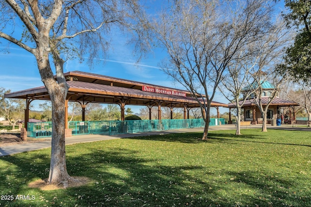 surrounding community featuring a gazebo and a yard