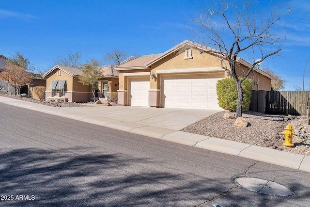 ranch-style home featuring a garage