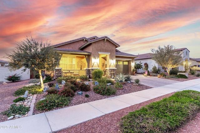 view of front of home with a garage