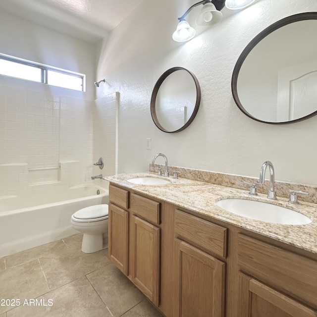 7117 W Globe Ave, Phoenix, AZ 85043 - full bath featuring double vanity, a sink, shower / bathtub combination, and toilet