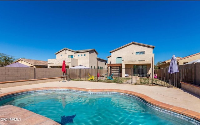7117 W Globe Ave, Phoenix, AZ 85043 - view of pool with a fenced in pool, a fenced backyard, and a patio area