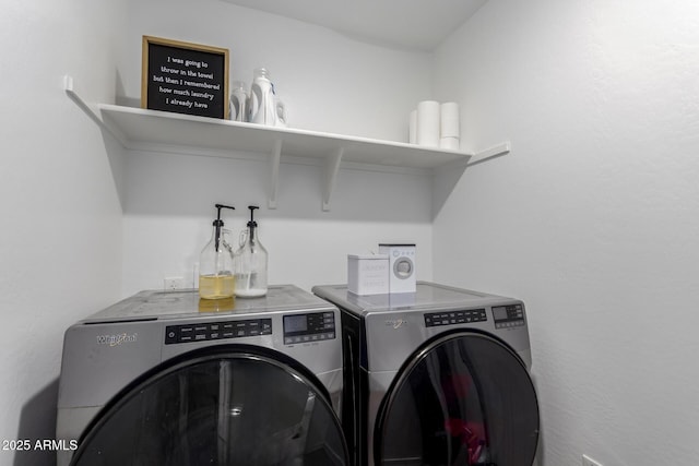 laundry room featuring laundry area and washing machine and clothes dryer