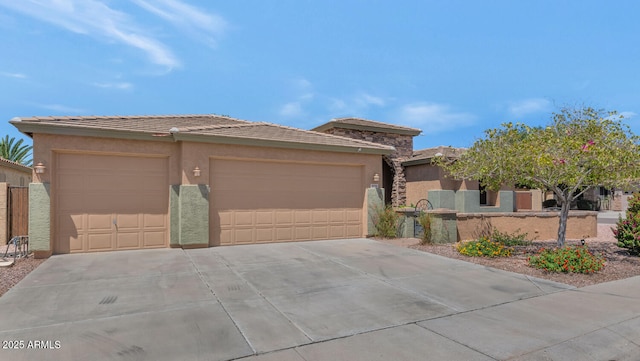 8210 W Wethersfield Rd, Peoria, AZ 85381 - view of front of home featuring stucco siding, a tiled roof, and driveway