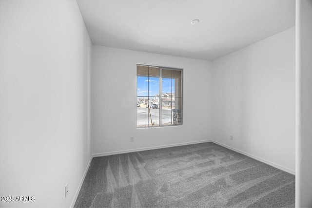 unfurnished room with carpet floors