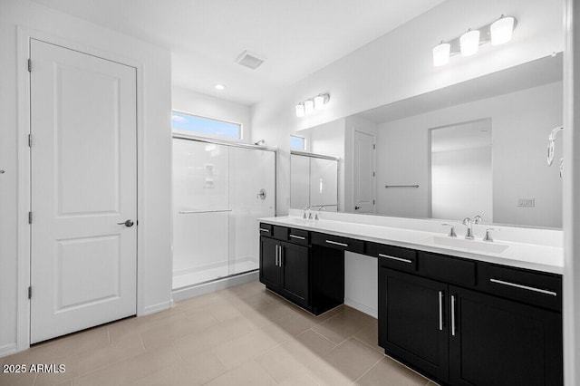 bathroom with vanity and walk in shower