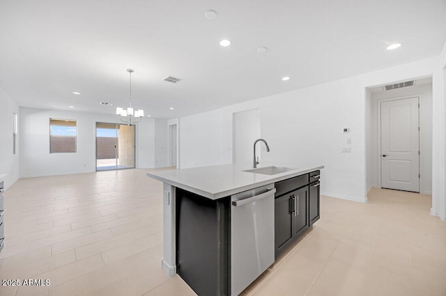 kitchen with sink, decorative light fixtures, dishwasher, a notable chandelier, and a kitchen island with sink