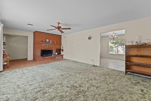 1455 W Kenrick Dr, Wickenburg, AZ 85390 - living room with a ceiling fan, carpet, a chandelier, and a brick fireplace