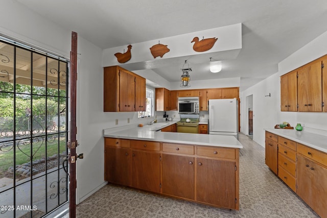 1455 W Kenrick Dr, Wickenburg, AZ 85390 - kitchen with white appliances, light countertops, and light floors