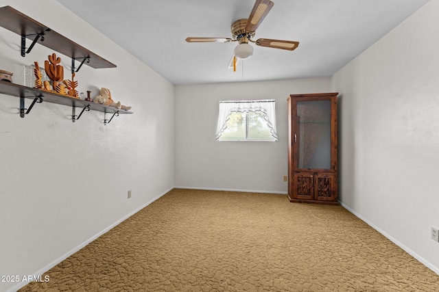 1455 W Kenrick Dr, Wickenburg, AZ 85390 - carpeted spare room with a ceiling fan and baseboards