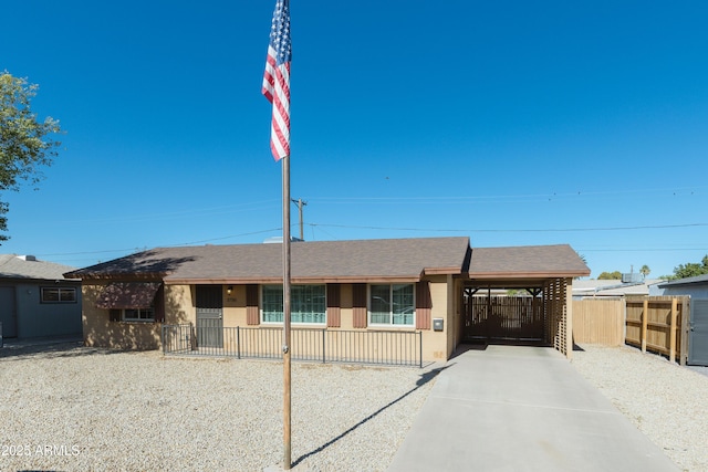 single story home with a carport