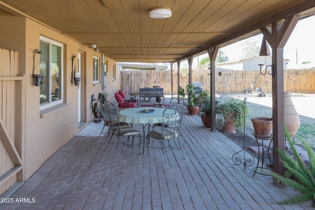 wooden deck featuring a patio