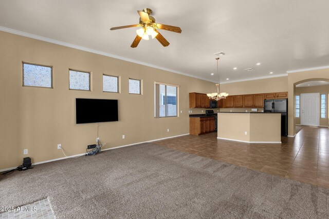 34944 N Mirandesa Dr, San Tan Valley, AZ 85143 - unfurnished living room featuring ornamental molding, baseboards, a ceiling fan, arched walkways, and a chandelier