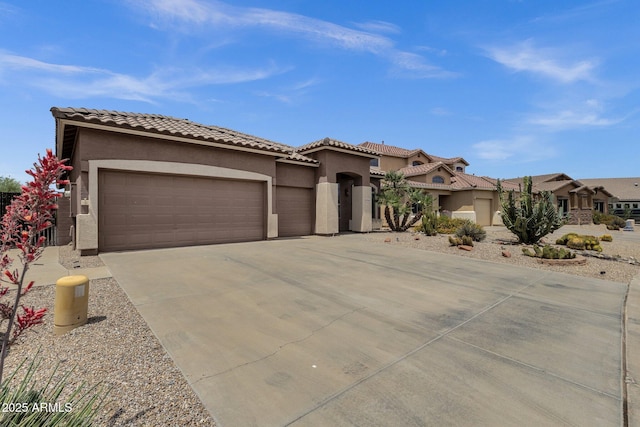 34944 N Mirandesa Dr, San Tan Valley, AZ 85143 - mediterranean / spanish home with stucco siding, concrete driveway, a garage, and a tiled roof