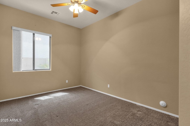 34944 N Mirandesa Dr, San Tan Valley, AZ 85143 - empty room featuring ceiling fan, dark colored carpet, and baseboards