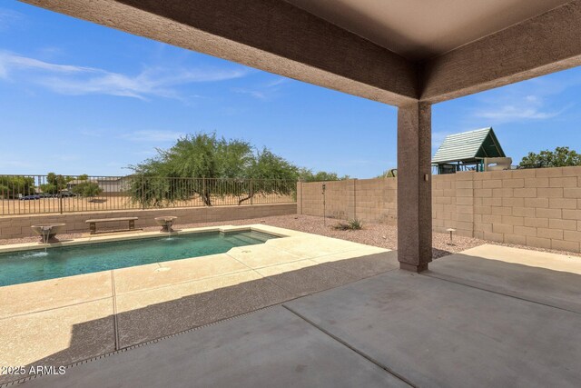 34944 N Mirandesa Dr, San Tan Valley, AZ 85143 - view of swimming pool with a fenced backyard and a patio area