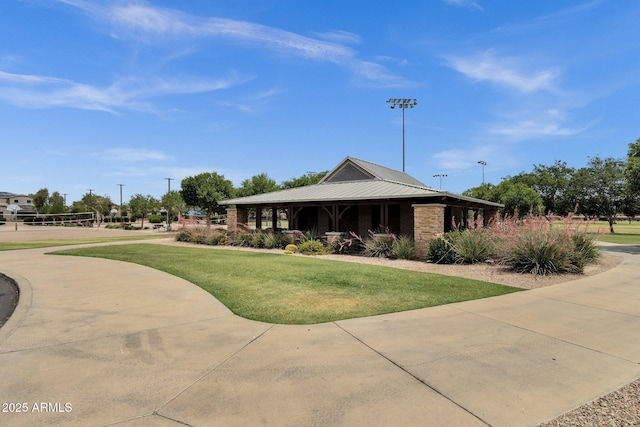 34944 N Mirandesa Dr, San Tan Valley, AZ 85143 - view of property's community featuring a lawn and driveway