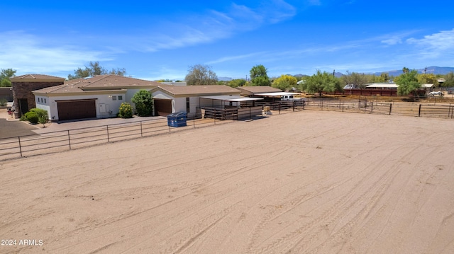 view of front of home featuring a rural view