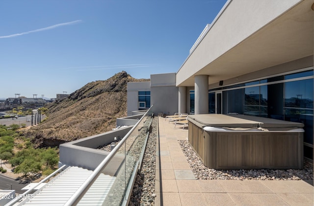 view of patio / terrace featuring a hot tub