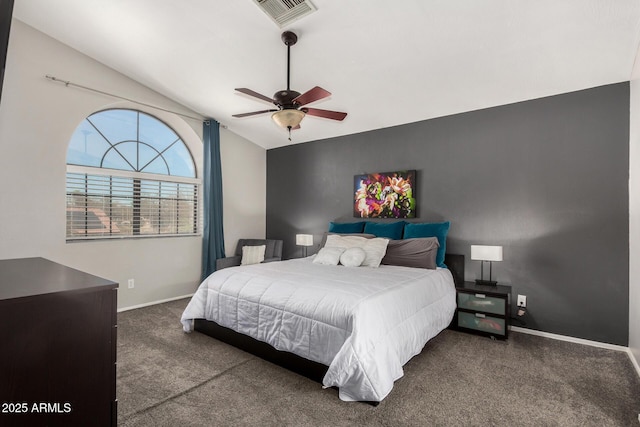 carpeted bedroom with visible vents, vaulted ceiling, baseboards, and ceiling fan