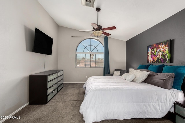 bedroom featuring lofted ceiling, ceiling fan, visible vents, baseboards, and dark colored carpet