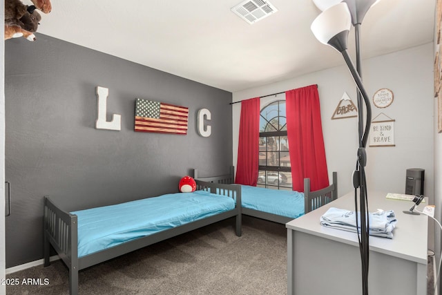 carpeted bedroom with visible vents