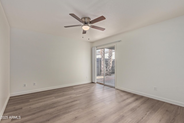 unfurnished room with ceiling fan and light hardwood / wood-style floors