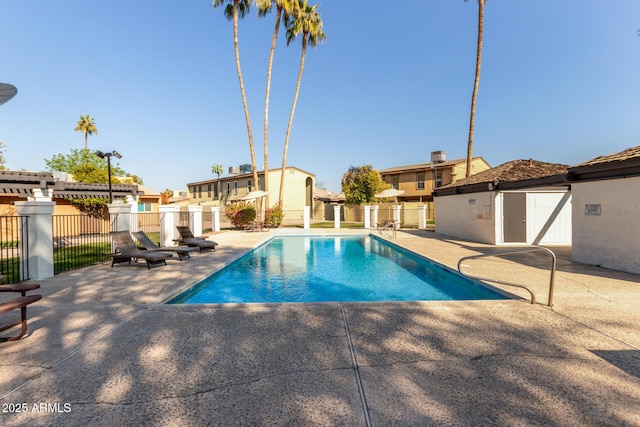 view of swimming pool featuring a patio