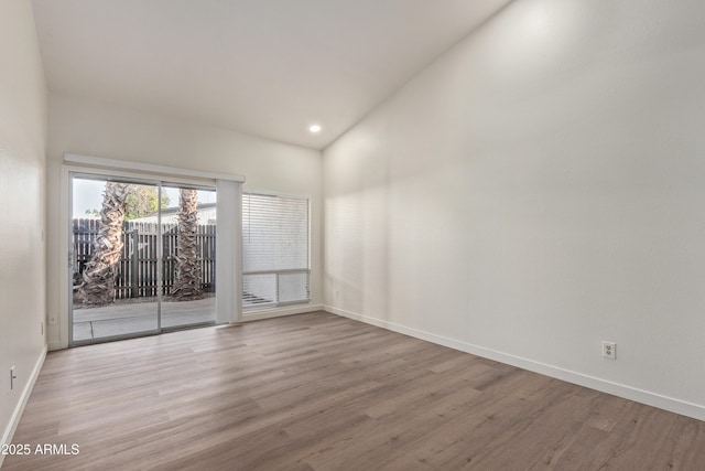 empty room featuring wood-type flooring