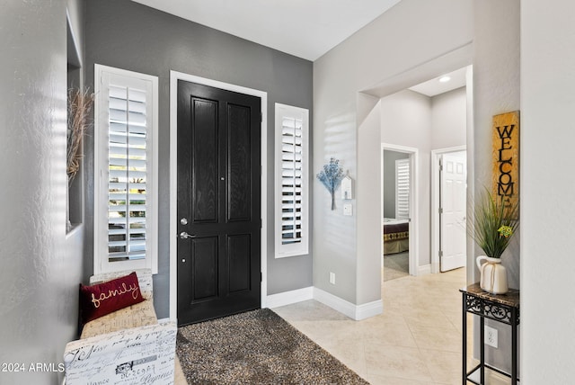 view of tiled foyer entrance